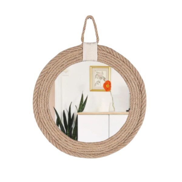 Miroir rond et élégant en rotin sur fond blanc
