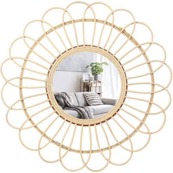 Miroir rond en rotin de style moderne sur fond blanc