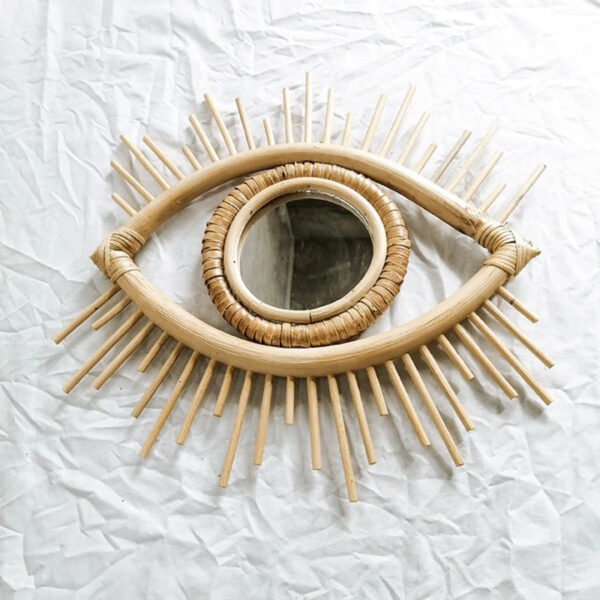 Miroir en rotin au design d’œil